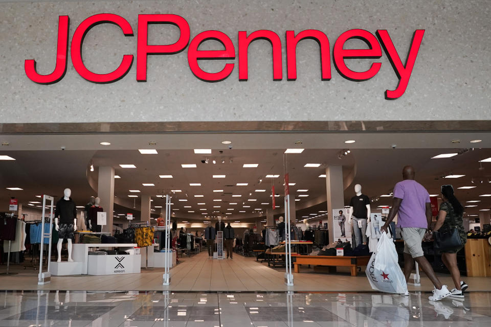 File - A couple approaches a JCPenney store in Frisco, Texas, on Aug. 30, 2023. A surge in U.S. consumer spending is fueling economic growth, reflecting a resilience among households that has confounded economists, Federal Reserve officials and even the sentiments that Americans themselves have expressed in surveys. (AP Photo/LM Otero, File)