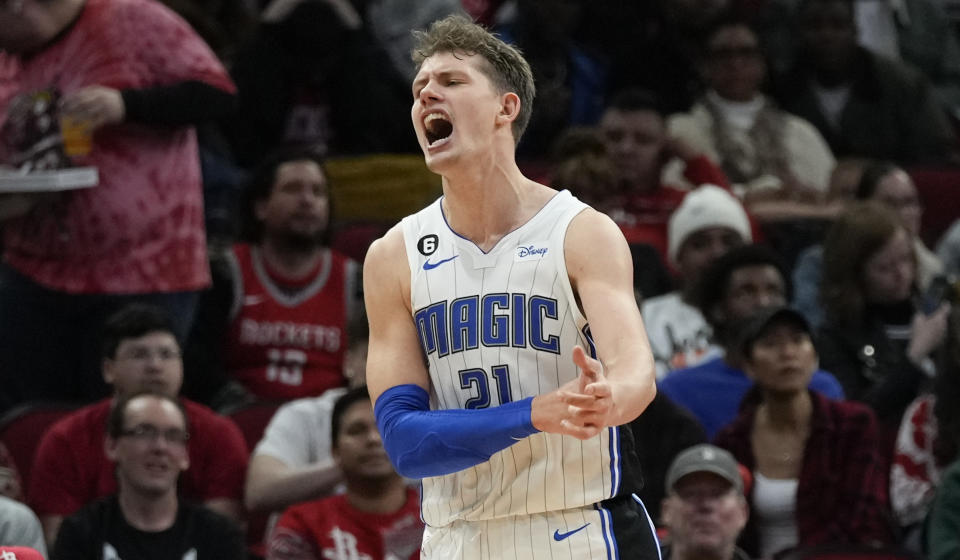 Orlando Magic center Moritz Wagner reacts after making a basket and drawing a foul during the second half of an NBA basketball game against the Houston Rockets, Wednesday, Dec. 21, 2022, in Houston. (AP Photo/Eric Christian Smith)