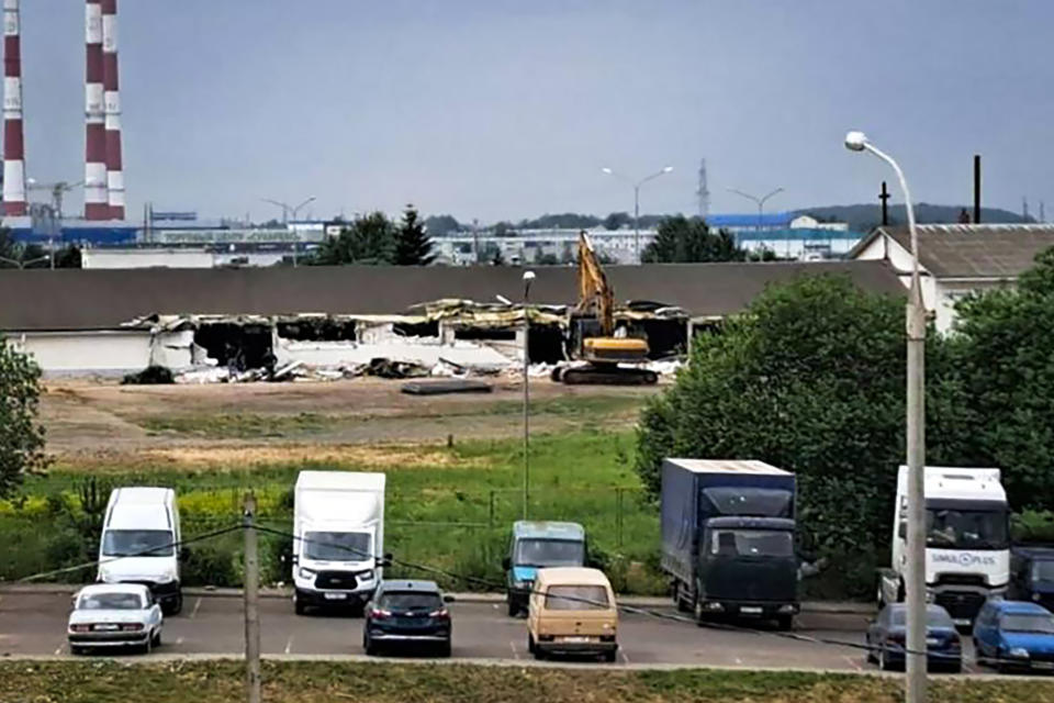 In this photo taken and released by the Viasna Human Rights Center, bulldozers raze the Pentecostal New Life Church on the outskirts of Minsk, Belarus, in the summer of 2023. The church, founded in 2002 and housed in a converted cowshed, had become one of Belarus' most prominent venues for interfaith dialogue. Its pastor, the Rev. Viachaslau Hancharenka, was repeatedly fined and detained after officials deemed the church's social media platforms to carry "extremist" content. (Viasna Human Rights Center via AP)