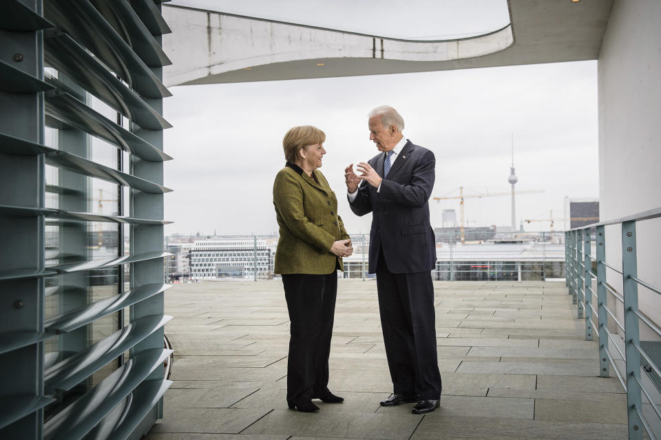 Image: Angela Merkel and Joe Biden  (Steffen Kugler-Bundesregierung / Getty Images file)