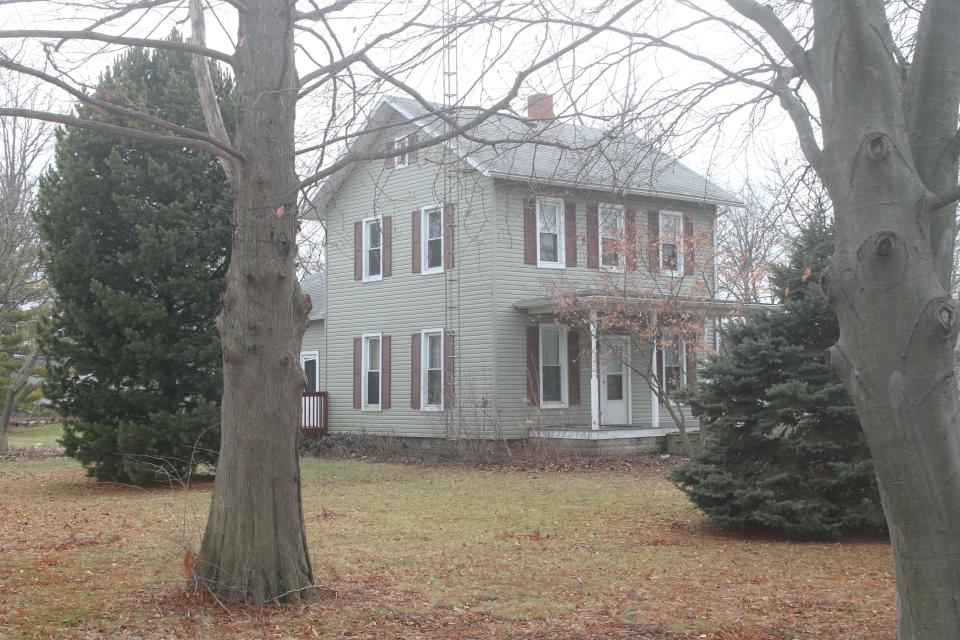 Port Clinton police say they believe 14-year-old Harley Dilly, reported missing on Dec. 21, climbed the antenna tower of this house to the roof and then entered the chimney, where his body was found Monday night.