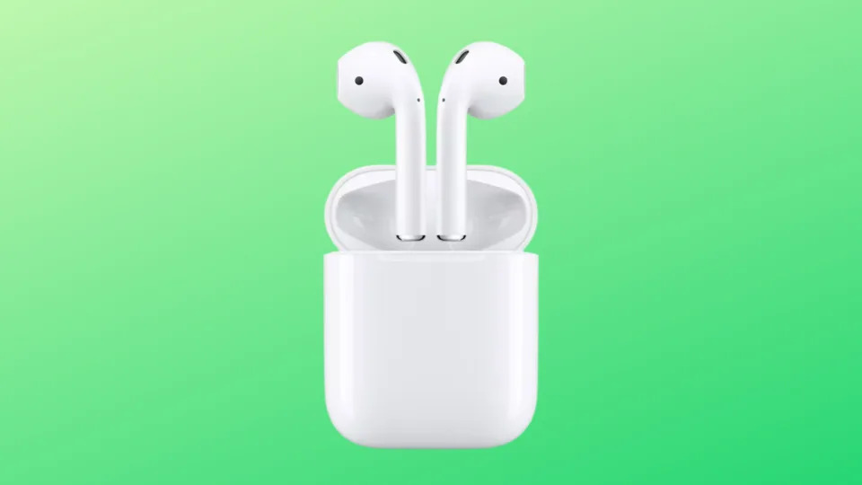 airpods against a green background