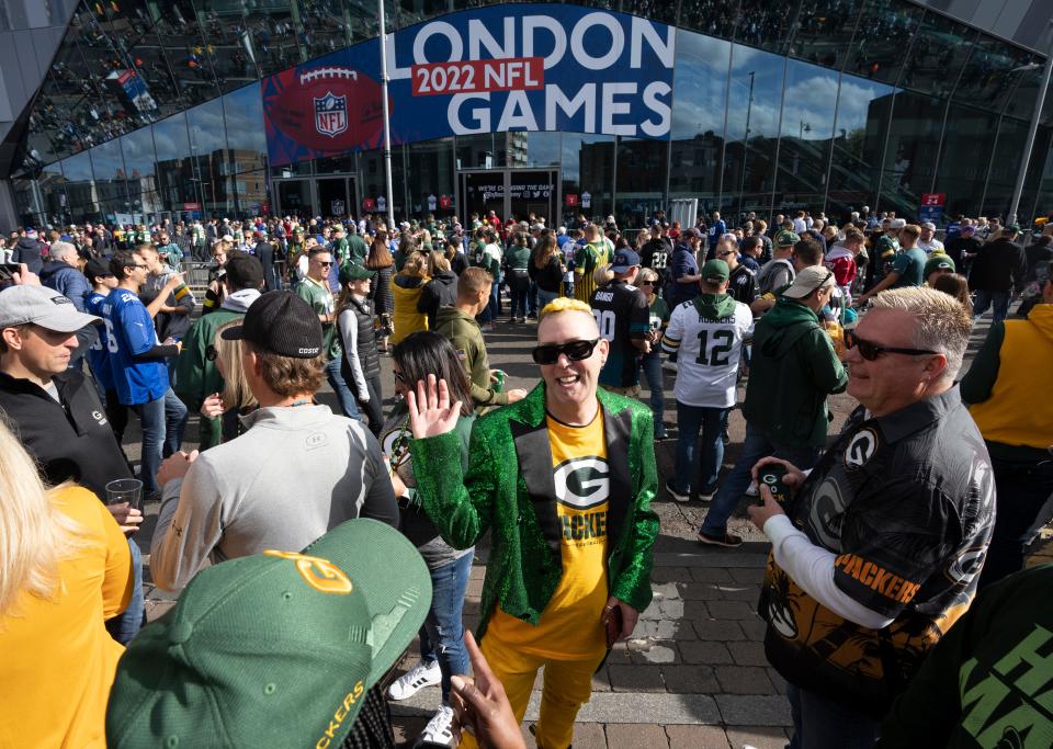 Racine residents Allen Mierisch, left, and his husband David Gautsch socialize before the Green Bay Packers game against the New York Giants Sunday, October 9, 2022 outside Tottenham Hotspur Stadium in London. The Green Bay Packers will play their first game ever in the United Kingdom on Sunday against the New York Giants.