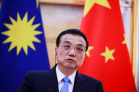 China's Premier Li Keqiang speaks during a news conference with Malaysia's Prime Minister Mahathir Mohamad (not pictured) at the Great Hall of the People in Beijing, China, August, 20, 2018. How Hwee Young/Pool via REUTERS