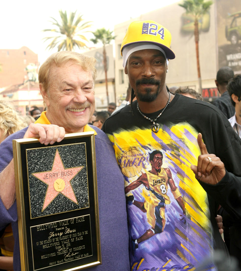 Jerry Buss and Snoop Dogg during Jerry Buss Honored with a Star on the Hollywood Walk of Fame at Hollywood Blvd. in Hollywood, CA, United States. (Photo by M. Phillips/WireImage)