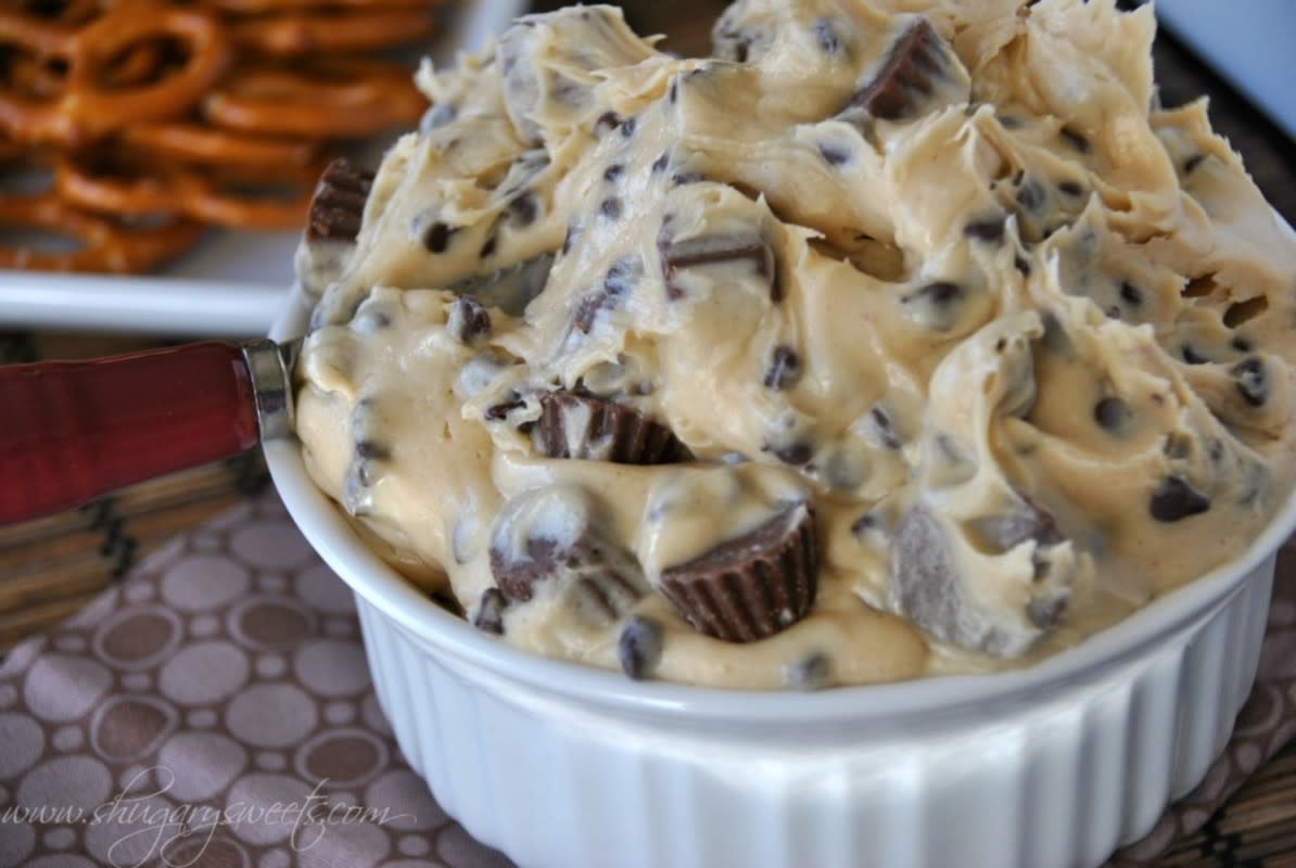 <p>Shugary Sweets</p><p>Want to be invited back to the next party? This Peanut Butter Cookie Dough Dip almost guarantees a standing invitation. </p><p><strong>Get the recipe: <a href="http://www.shugarysweets.com/2013/01/reeses-peanut-butter-cookie-dough-dip" rel="nofollow noopener" target="_blank" data-ylk="slk:Peanut Butter Cookie Dough Dip;elm:context_link;itc:0;sec:content-canvas" class="link rapid-noclick-resp">Peanut Butter Cookie Dough Dip</a></strong></p>