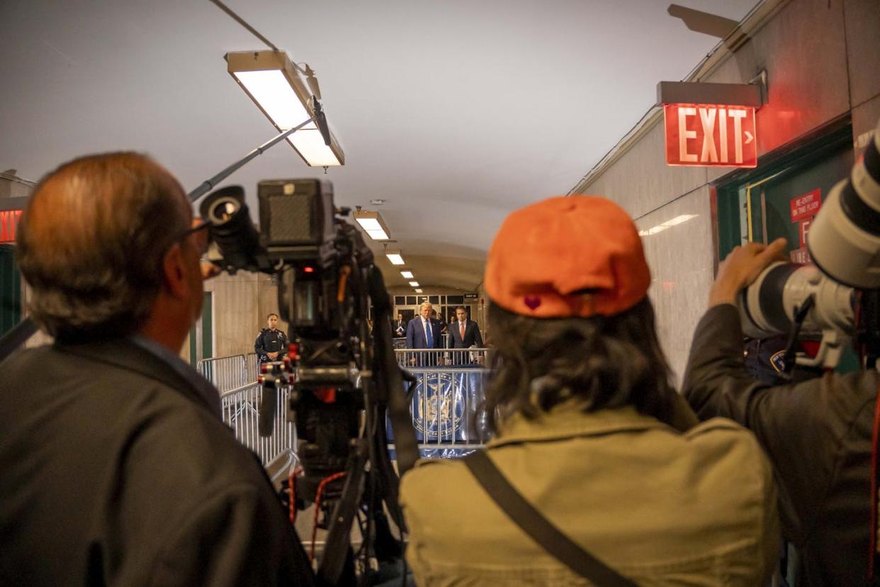 Donald Trump, with his lawyers, talks to the press pool outside a Manhattan criminal courtroom during his hush-money trial on May 3, 2024. <a href="https://www.gettyimages.com/detail/news-photo/former-president-donald-trump-with-his-lawyers-talks-to-the-news-photo/2150768482?adppopup=true" rel="nofollow noopener" target="_blank" data-ylk="slk:Mark Peterson - Pool/Getty Images;elm:context_link;itc:0;sec:content-canvas" class="link ">Mark Peterson - Pool/Getty Images</a>