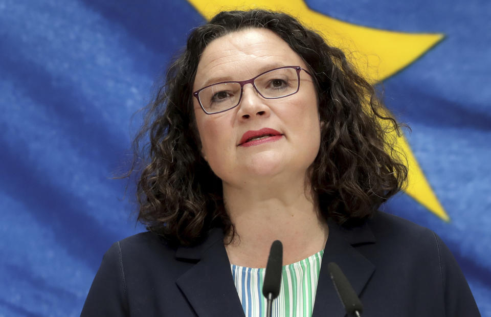FILE -- In this Monday, May 27, 2019 photo taken with a long time expsure Andrea Nahles, chairwomen of the German Social Democratic Party (SPD), addresses the media during a press conference following a party's board meeting in Berlin, Germany. Nahles, the leader of Germany's center-left Social Democrats, a junior party in Chancellor Angela Merkel's governing coalition, is resigning after poor elections results. (AP Photo/Michael Sohn, file)