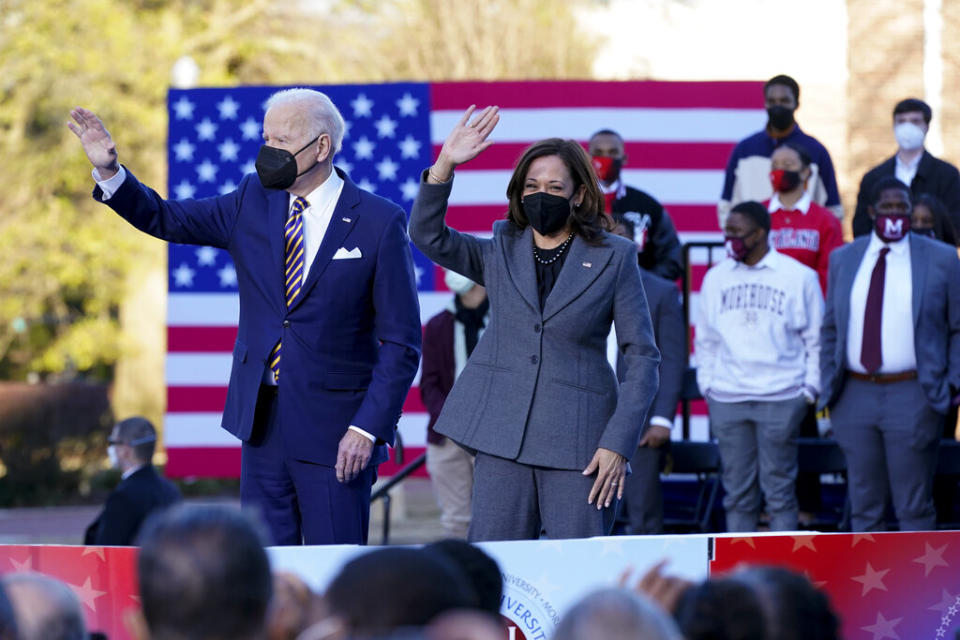 President Joe Biden and Vice President Kamala Harris wave after speaking Tuesday at Clark Atlanta University in support of changing the Senate filibuster rules so voting rights legislation can move forward. (AP Photo/Patrick Semansky)