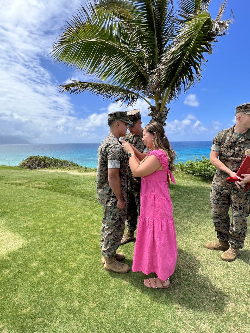 Josie Cruz and Cpl. Jake Dennen pin Alec Cruz to the rank of corporal. Cruz was recently named USO Marine of the Year. The 21-year-old, who graduated from Deltona High School in 2019, is stationed in Hawaii.