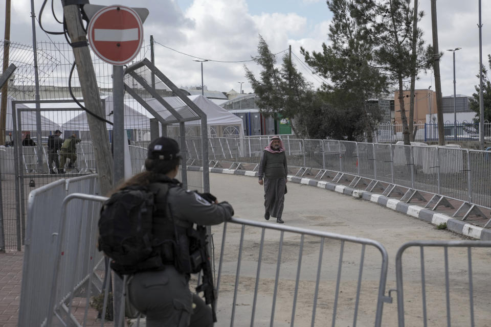 Palestinians cross from the West Bank city of Bethlehem to Jerusalem to participate in Friday prayers at the Al-Aqsa Mosque compound during the Muslim holy month of Ramadan on Friday, March 15, 2024. (AP Photo/Mahmoud Illean)