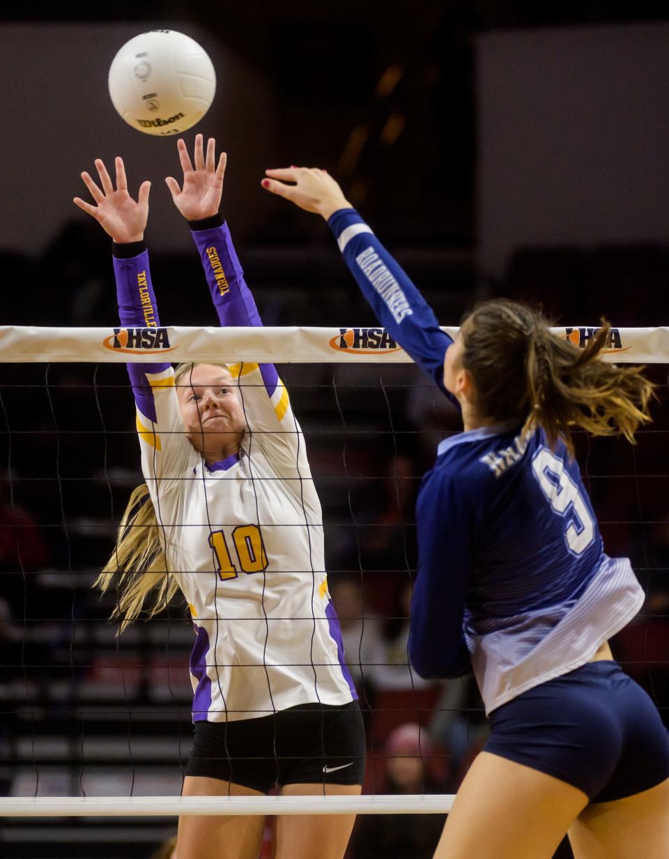 Taylorville's Elle Richards (10) defends against a shot from Nazareth Academy's Jane Manecke during their Class 3A volleyball state semifinal Friday, Nov. 11, 2022 at CEFCU Arena in Normal.