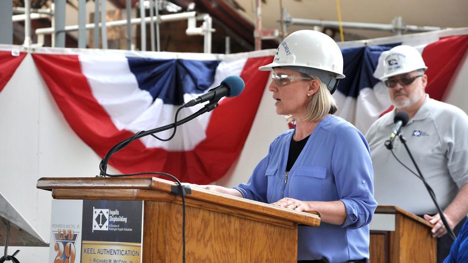 Kari Wilkinson, who now serves as the president of Ingalls Shipbuilding, delivers remarks during the keel authentication ceremony for the future USS Richard M. McCool Jr. (LPD 29) at Ingalls Shipbuilding on April 12, 2019. (Samantha Crane/U.S. Navy)