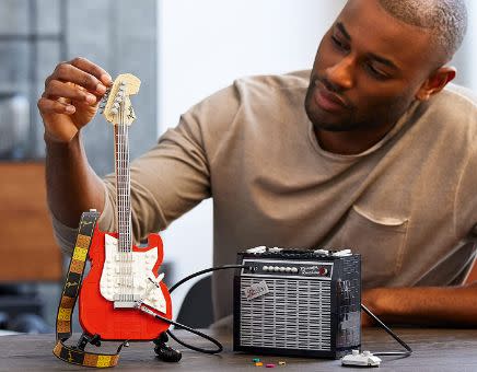 Give him a mindful treat that'll look good displayed once's he built it, too