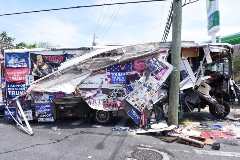The left side of the vehicle was left a wreck, with many of its posters torn off. White