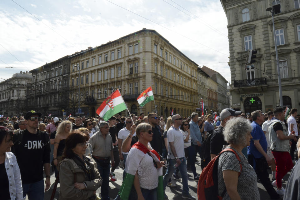 People gather in support of a political newcomer Peter Magyar, a former insider within Hungary's ruling Fidesz party on Saturday, April 6, 2024. A rising challenger to Hungarian Prime Minister Viktor Orbán mobilized tens of thousands of supporters outlining a plan to unite the country and bring an end to the populist leader's 14-year hold on power. (AP Photo/Justin Spike)