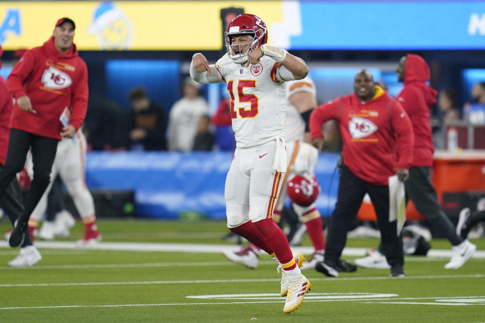 Kansas City Chiefs quarterback Patrick Mahomes (15) celebrates after the Chiefs defeated the Los Angeles Chargers in an NFL football game Thursday, Dec. 16, 2021, in Inglewood, Calif. The Chiefs won 34-28. (AP Photo/Ashley Landis)