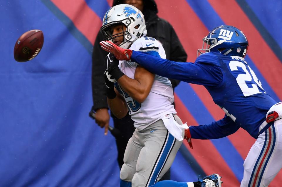 <p>Detroit Lions wide receiver Golden Tate (15) attempts to catch a pass as New York Giants cornerback Eli Apple (24) defends in the first half at MetLife Stadium. Mandatory Credit: Robert Deutsch-USA TODAY Sports </p>