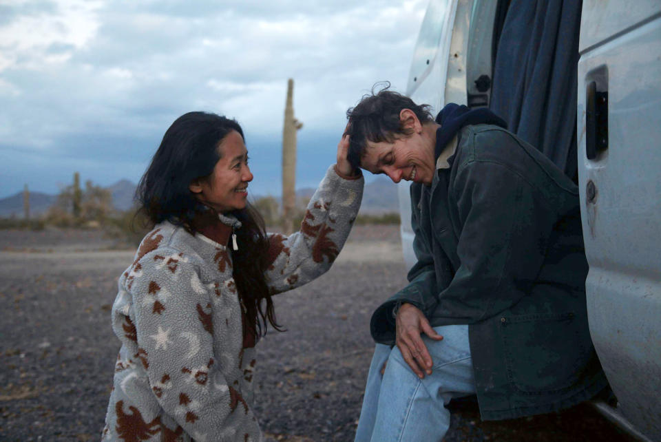 Director Chloe Zhao, left, appears with actress Frances McDormand on the set of "Nomadland." (Searchlight Pictures via AP)