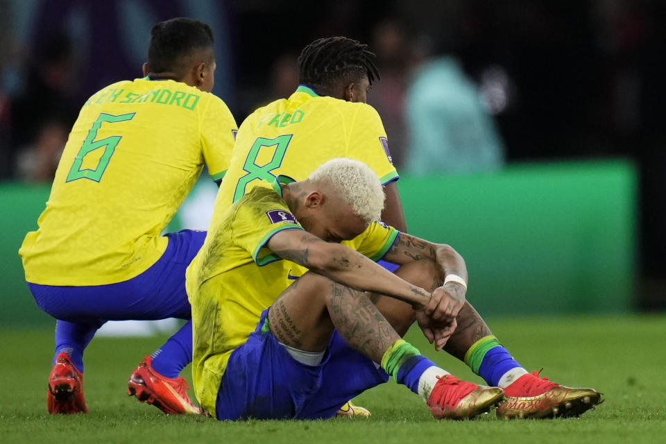 Neymar sits on the pith after Brazil's lost against Croatia in a penalty shootout in a World Cup quarterfinal soccer matchat the Education City Stad ium in Al Rayyan, Qatar, Friday, Dec. 9, 2022. (AP Photo/Manu Fernandez)