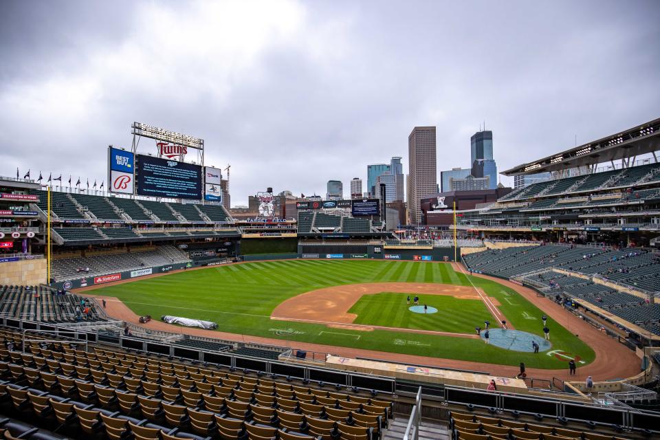 Signage on the Target Field video board shows that Monday's game between the Boston Red Sox and Minnesota Twins is postponed.