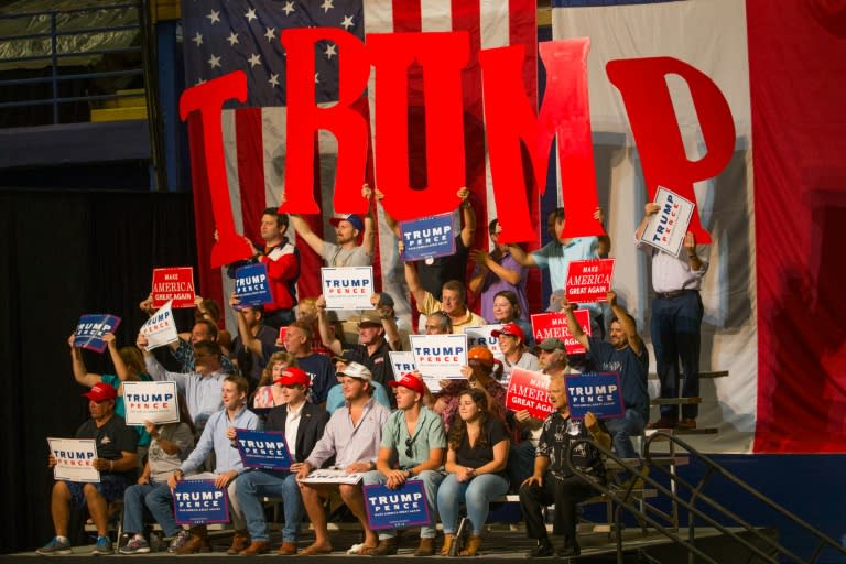 Supporters of Republican presidential candidate Donald Trump cheer during a rally at the Travis County Exposition Center on August 23, 2016 in Austin, Texas