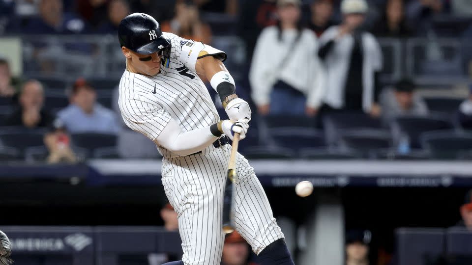 Aaron Judge hits a three-run home run against the Baltimore Orioles in the ninth inning at Yankee Stadium. - Brad Penner/USA TODAY Sports/Reuters