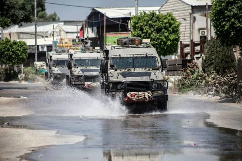 Israeli army vehicles are seen during a raid in the Nur Shams camp for Palestinian refugees in the occupied West Bank. Nasser Ishtayeh/SOPA Images via ZUMA Press Wire/dpa