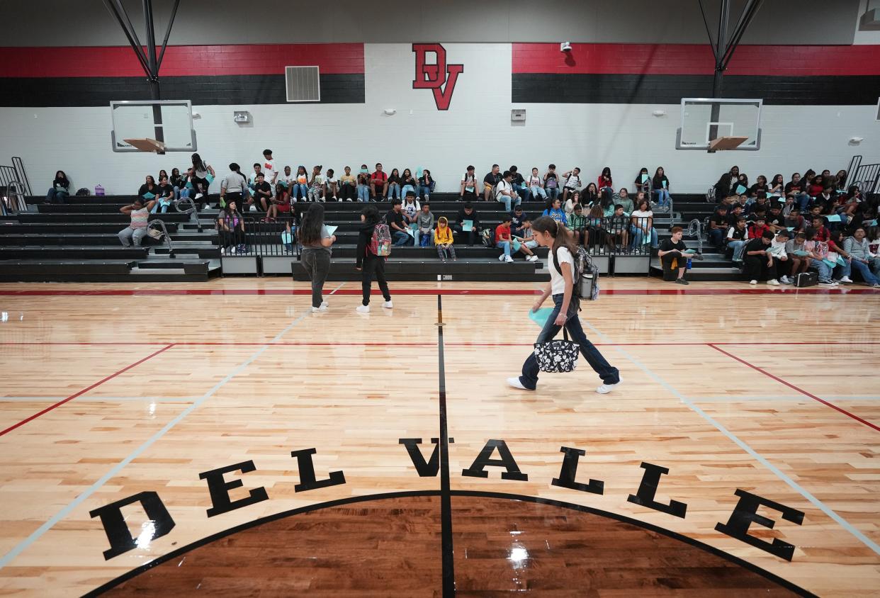 Students arrive for the first day of school at Del Valle Middle School on Aug. 9, 2023.