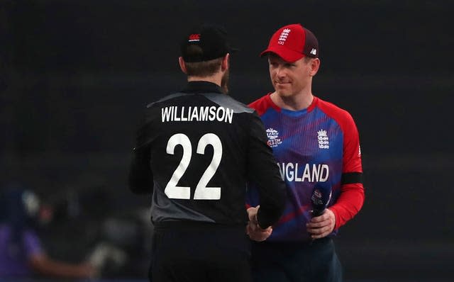 Eoin Morgan, right, is determined to remain as England captain (Aijaz Rahi/AP/PA)