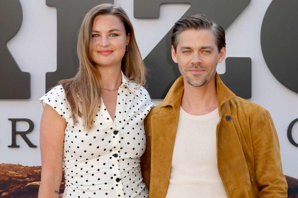 <p>Frazer Harrison/Getty</p> Jennifer Åkerman, Tom Payne