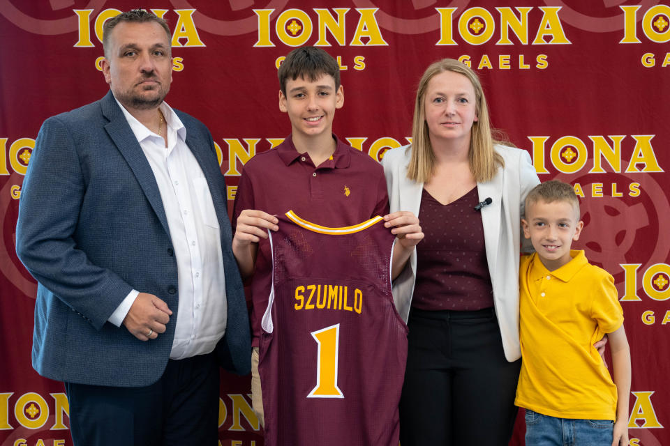 Iona's new women's basketball coach Angelika Szumilo poses with her family after being officially introduced as the Gaels' new coach on Monday, April 24, 2023.