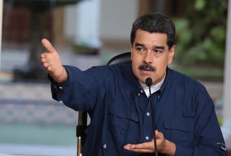 Venezuela's President Nicolas Maduro speaks during a meeting at Miraflores Palace in Caracas, Venezuela August 25, 2017. Miraflores Palace/Handout via REUTERS