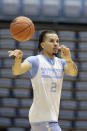 In this photo taken Wednesday, Oct. 2, 2019, North Carolina's Cole Anthony passes during an NCAA college basketball practice in Chapel Hill, N.C. (AP Photo/Gerry Broome)