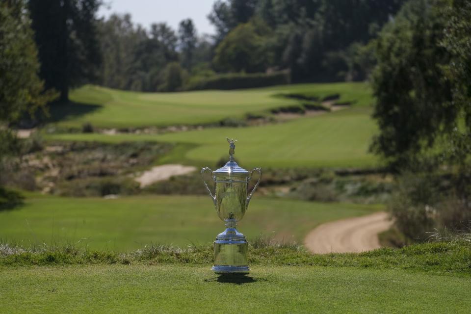 The US Open championship trophy on display on the seventh hole off the tee at the Los Angeles Country Club.