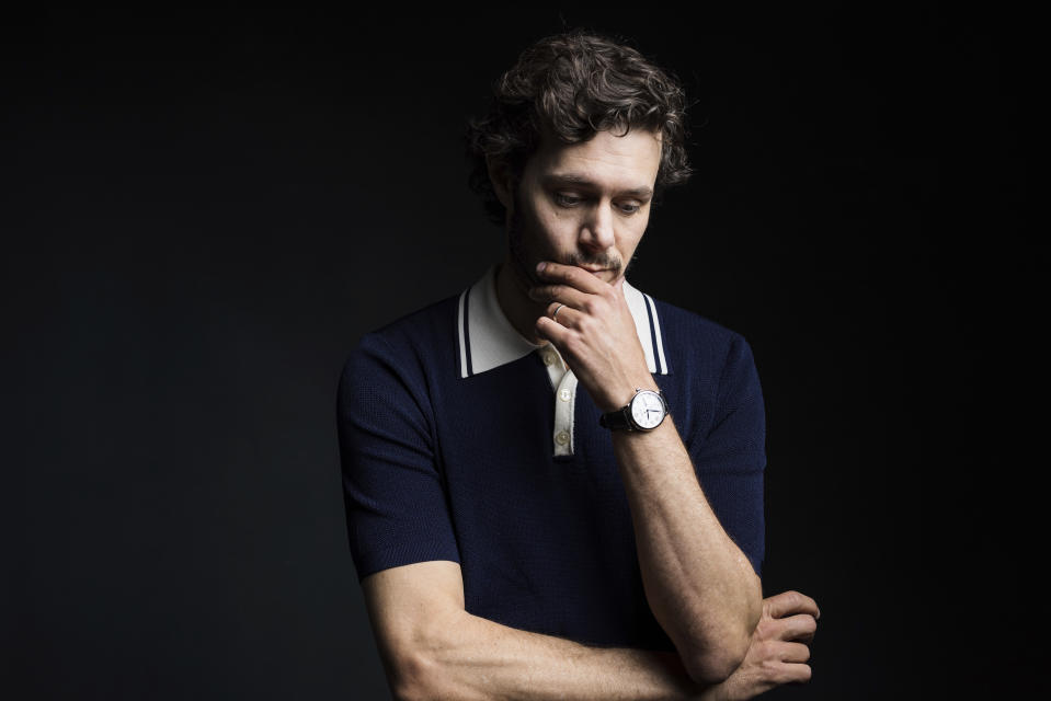 Adam Brody poses for a portrait to promote the film "Shazam! Fury of the Gods" at The London Hotel in West Hollywood, Calif., on Monday, Feb. 27, 2023. (Photo by Willy Sanjuan/Invision/AP)