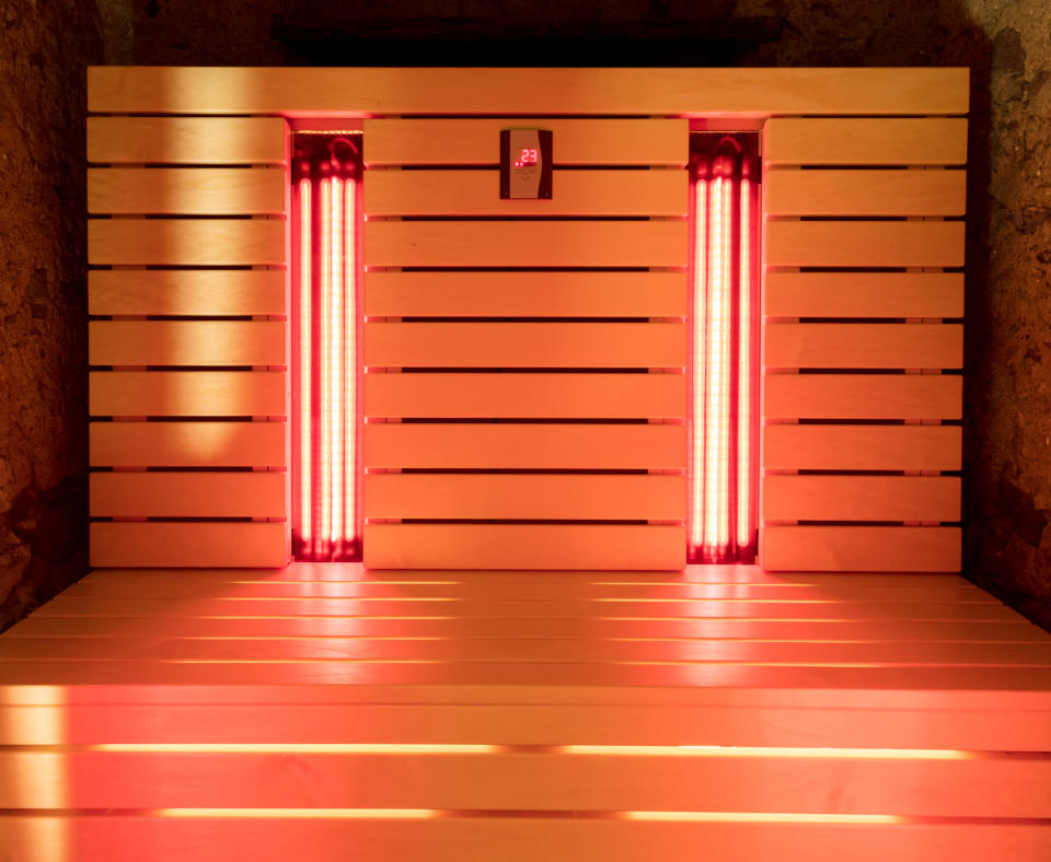 Infrared saunas can help with muscle aches and pains. (Photo: Getty Images)