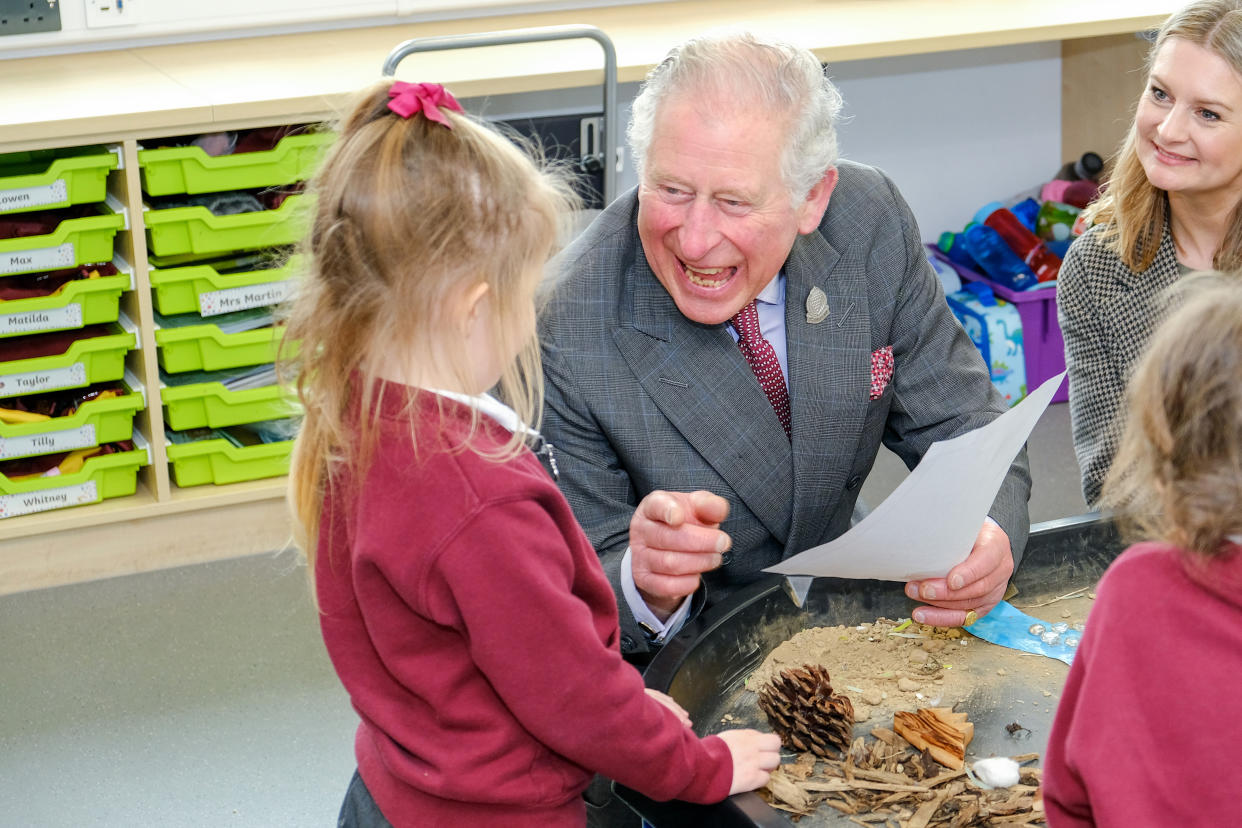 The Prince of Wales greets school children as he attends a reception in Newquay, Cornwall, to celebrate the 30th anniversary of Surfers Against Sewage and officially opens the Nansledan development school.