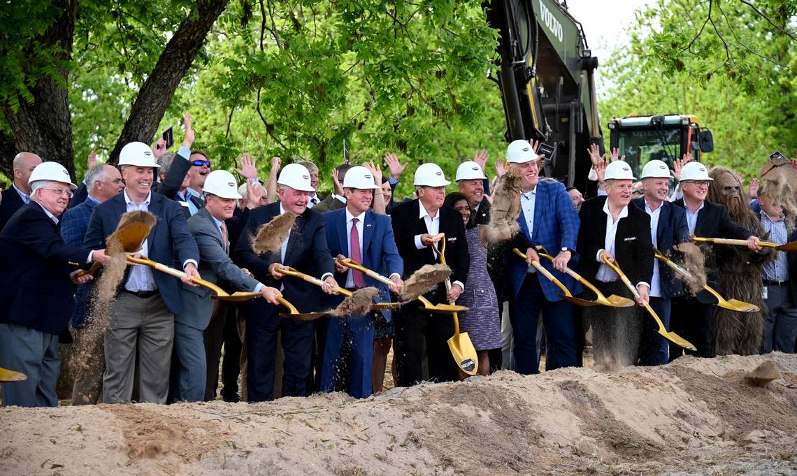 Dignitaries including Governor Brain Kemp, University System of Georgia Chancellor Sonny Perdue and founder Jack Link toss dirt during a groundbreaking in April for a new Jack Link’s meat snacks facility in Perry. Jason Vorhees/The Telegraph