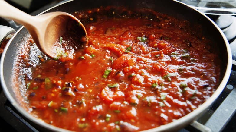 Tomato sauce in pan on stove