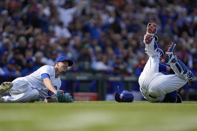 Cubs' Yan Gomes wears football helmet in postgame after tackling Drew Smyly  – NBC Sports Chicago