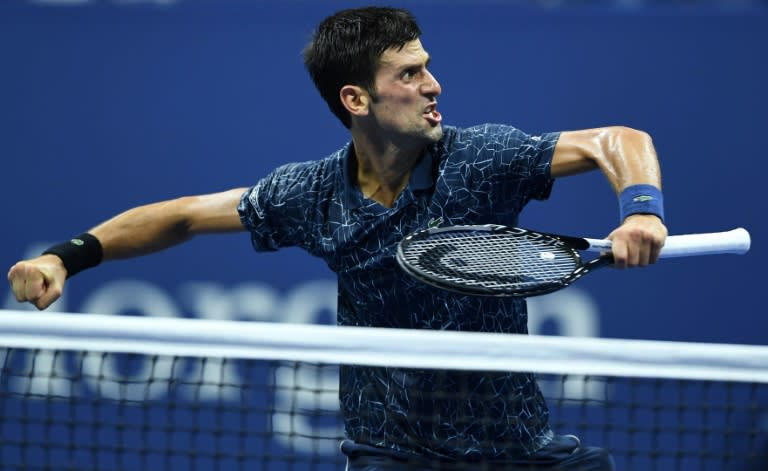 Novak Djokovic celebrates his US Open quarter-final victory over John Millman
