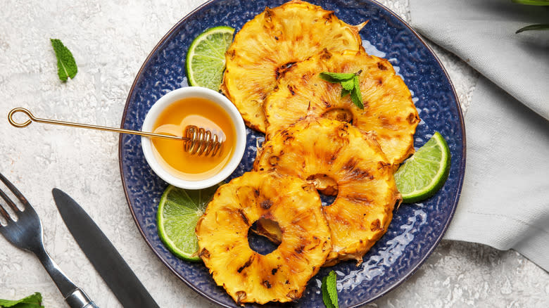 grilled pineapple slices on plate