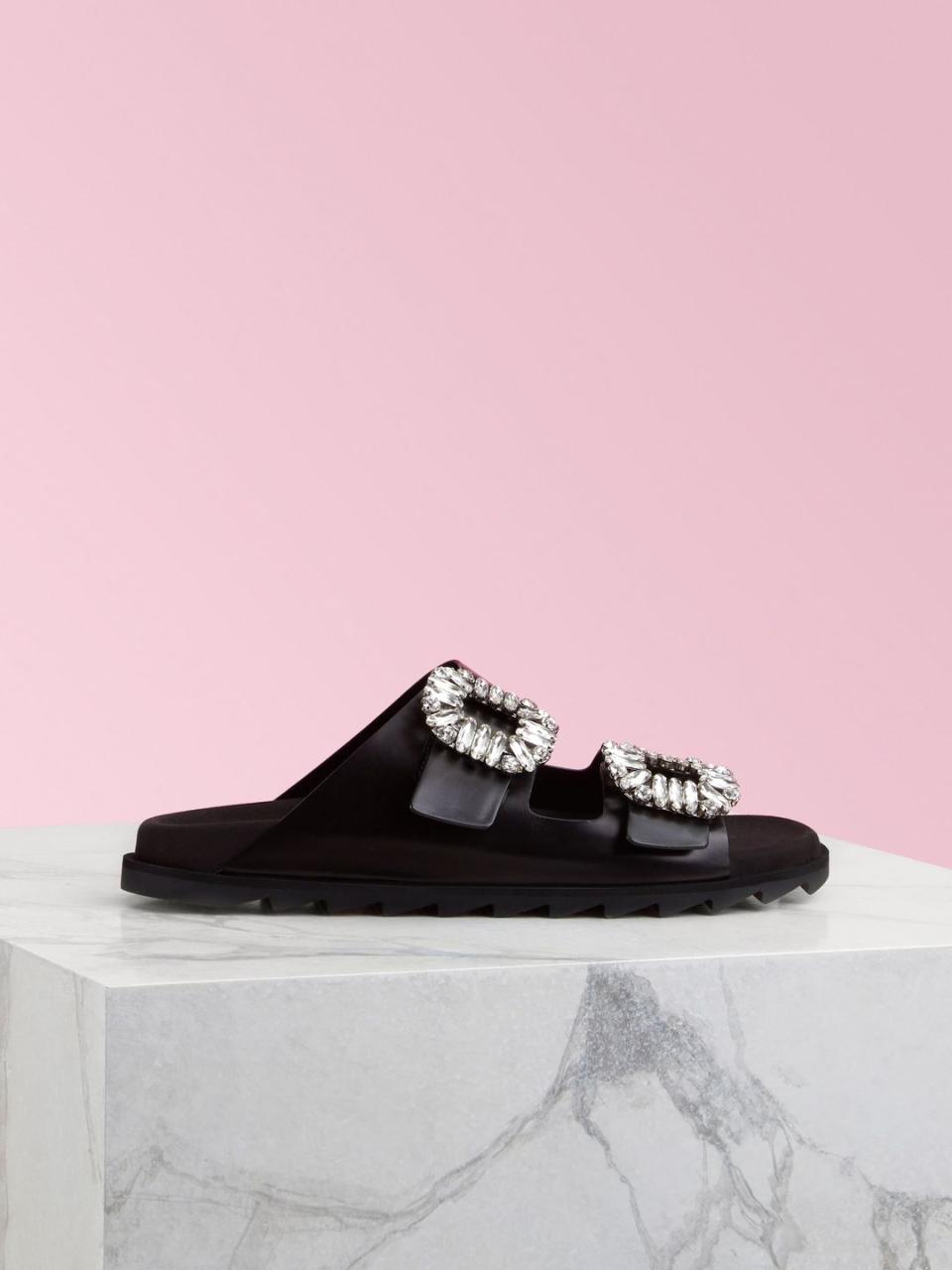 <p>Leather sandals, £820, Roger Vivier</p><p><a class="link " href="https://go.redirectingat.com?id=127X1599956&url=https%3A%2F%2Fwww.rogervivier.com%2Fgb-en%2FSlidy-Viv%27-Strass-Buckle-Sandals-in-Leather%2Fp%2FRVW45818820BSSB999%2F&sref=https%3A%2F%2Fwww.townandcountrymag.com%2Fuk%2Fstyle%2Ffashion%2Fg32698495%2Fwhat-to-wear-seaside-staycation%2F" rel="nofollow noopener" target="_blank" data-ylk="slk:Shop now;elm:context_link;itc:0;sec:content-canvas">Shop now</a></p>