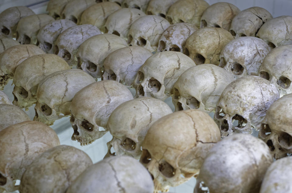 The skulls of some of those who were slaughtered sit in a glass case in a vault beneath the church, as a memorial to the thousands who were killed during the 1994 genocide in and around the Catholic church in Nyamata, Rwanda Thursday, April 4, 2019. Rwanda will commemorate on Sunday, April 7, 2019 the 25th anniversary of when the country descended into an orgy of violence in which some 800,000 Tutsis and moderate Hutus were massacred by the majority Hutu population over a 100-day period in what was the worst genocide in recent history. (AP Photo/Ben Curtis)