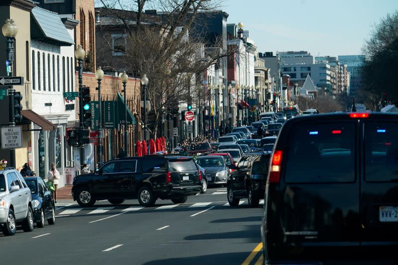 U.S. President Joe Biden's motorcade travels through the Georgetown neighborhood of Washington, DC en route to Holy Trinity Catholic Church in Washington