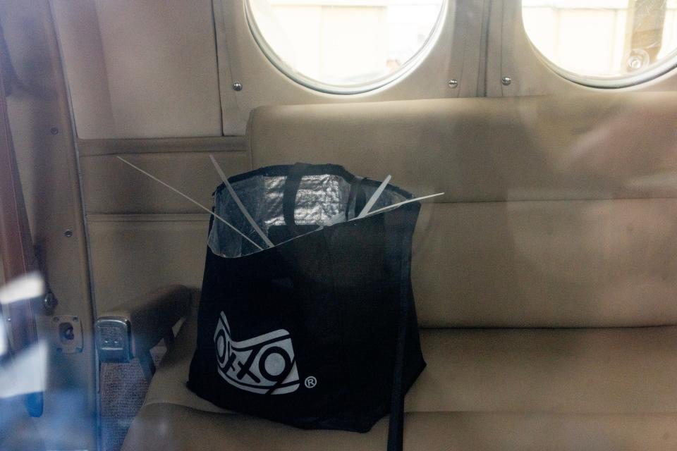 Plastic zip ties in a convenience store bag inside the plane that carried alleged drug kingpin Ismael "El Mayo" Zambada to the U.S. on Thursday, July 25, 2024.