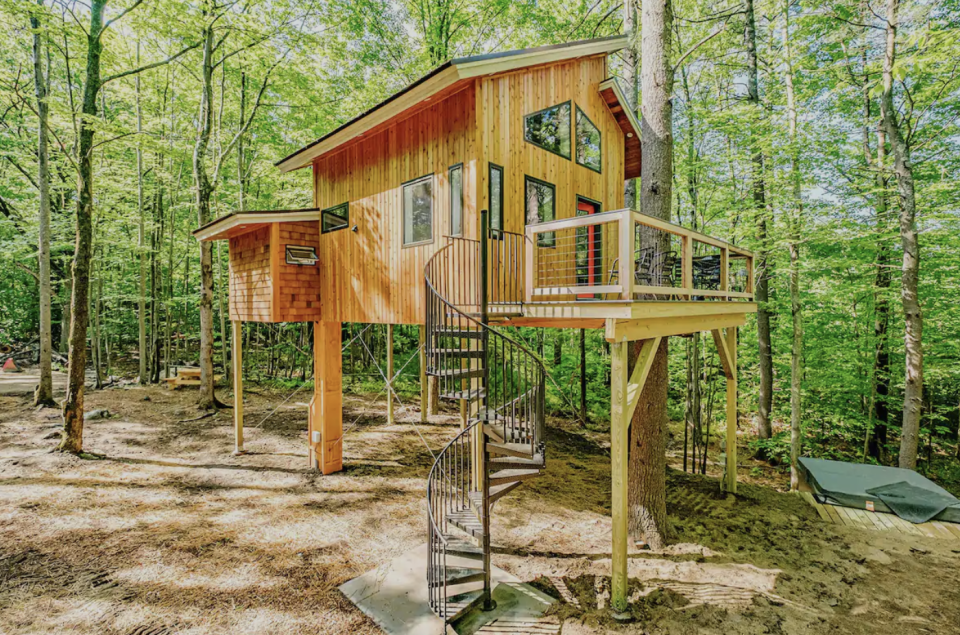 <p>While only 350 square feet, this eco-friendly tiny home among the trees in Sanford, Maine has everything you need for a relaxing stay. There's a full kitchen equipped with cookware, essential appliances, and more. The loft and attached sleeping pod both feature queen size beds. Not to mention, there are pristine views of trees that the owner describes as "green glass [that filters] the early morning light."</p><p><a class="link " href="https://www.airbnb.com/rooms/41341525" rel="nofollow noopener" target="_blank" data-ylk="slk:BOOK NOW;elm:context_link;itc:0;sec:content-canvas">BOOK NOW</a> <strong><em>Canopy Treehouse</em></strong></p>