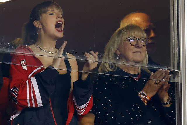 <p>David Eulitt/Getty </p> Taylor Swift and Donna Kelce cheer at Kansas City Chiefs v. Denver Broncos game in Kansas City, MO.