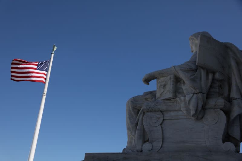 FILE PHOTO: The female figure called the Contemplation of Justice is seen in a general view of the U.S. Supreme Court building in Washington